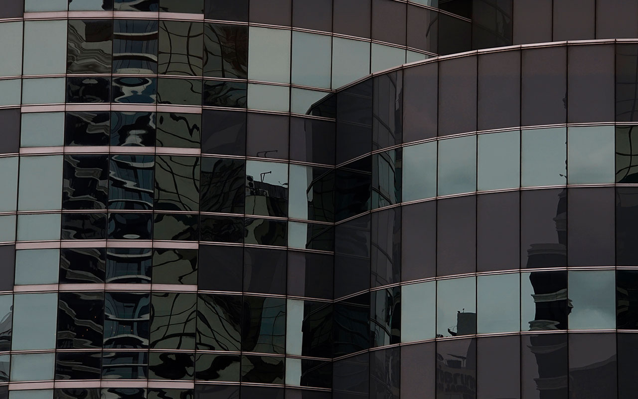vidrio-negro-crisvisa-Copia-de-luscious-green-blue-reflection-of-glass-building-window vidrio-negro-crisvisa-Copia-de-luscious-green-blue-reflection-of-glass-building-window